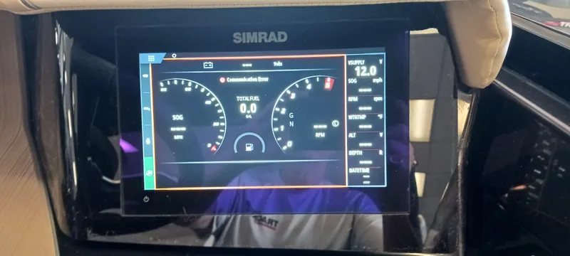 Slide: The Image of Simrad display on 2023 Heyday H22 boat dashboard showing speed and engine data. - 45