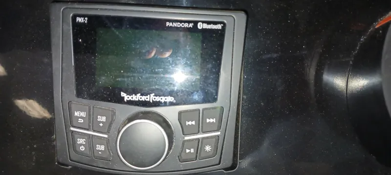 Slide: The Image of Rockford Fosgate audio system in 2023 Heyday H22 boat dashboard. - 46