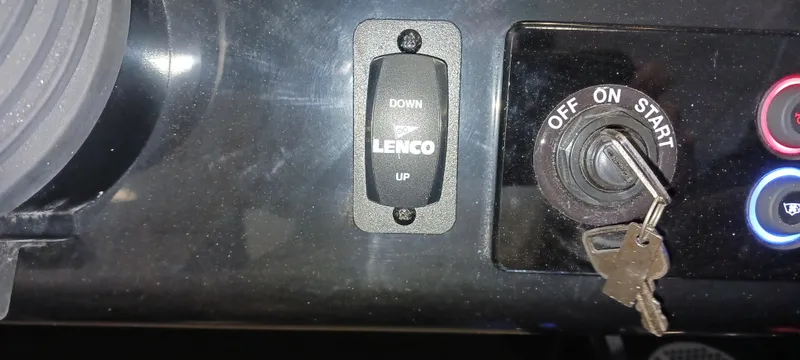 Slide: The Image of 2023 Heyday H22 boat dashboard with Lenco switch and ignition key. - 47