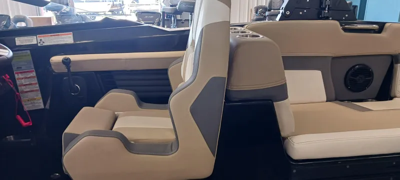 Slide: The Image of 2023 Heyday H22 boat interior with beige and gray seating. - 48