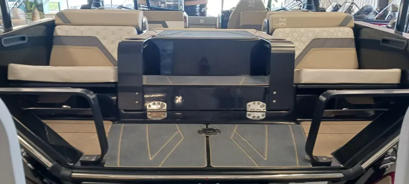 Slide: The Image of 2023 Heyday H22 boat interior with cushioned seating and sleek design. - 8