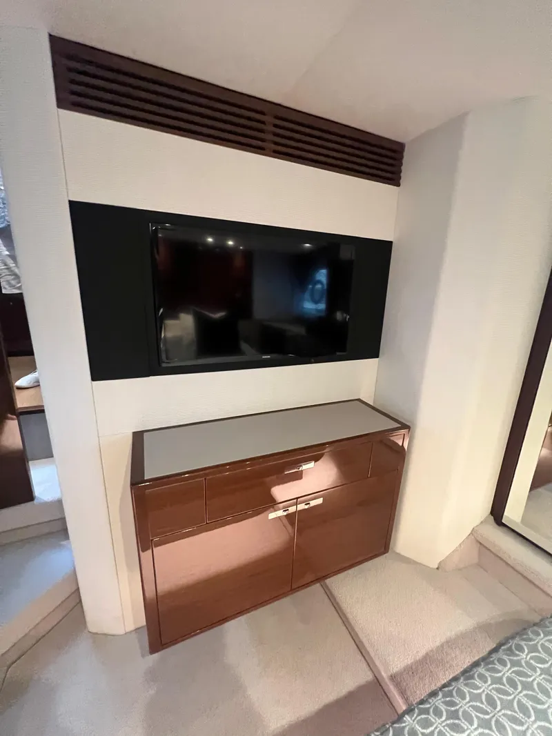 Slide: The Image of Luxurious bedroom interior of 2018 Princess V58 yacht with modern decor and ambient lighting. - 38