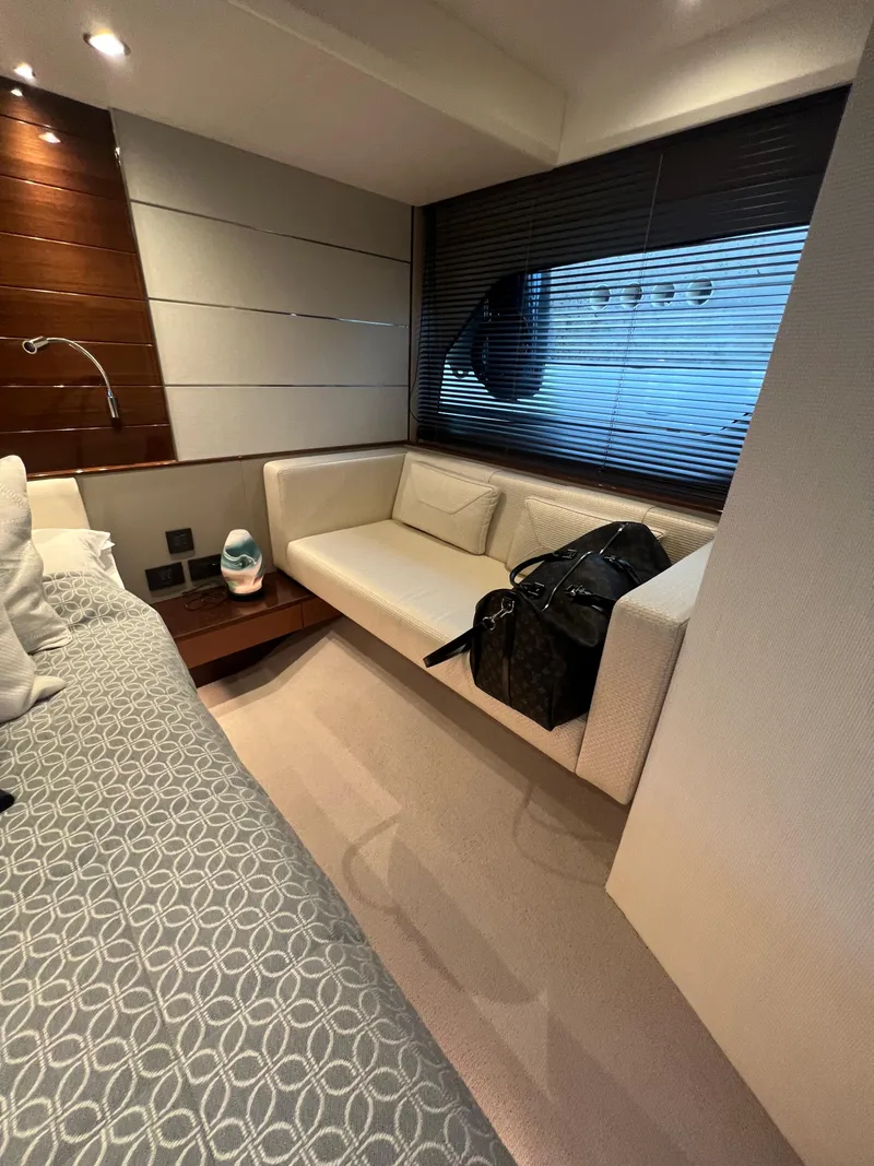 Slide: The Image of Luxurious bedroom interior of 2018 Princess V58 yacht with modern design and elegant bedding. - 39