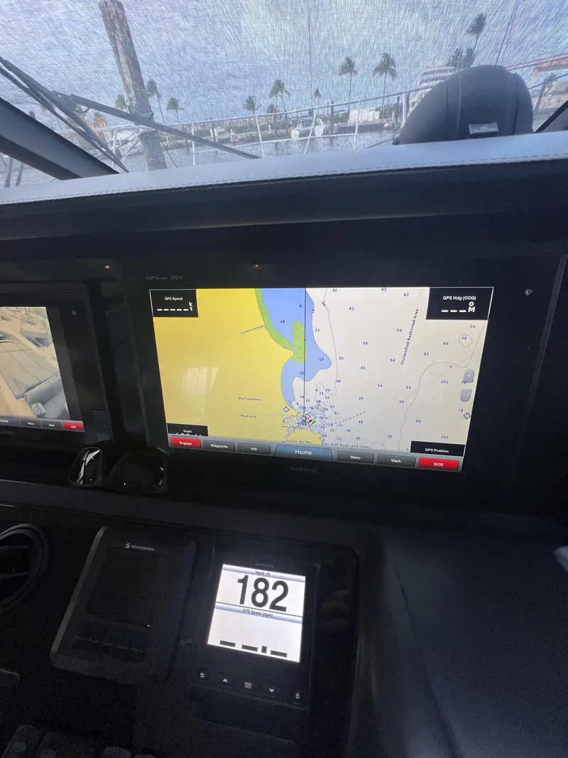 Slide: The Image of Control panel of a 2018 Princess V58 yacht with navigation display. - 46