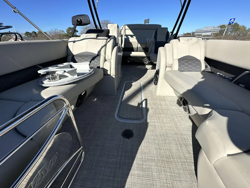 Slide: The Image of 2023 Silver Wave 2410 SW7 JS boat interior with plush seating and modern design. - 10