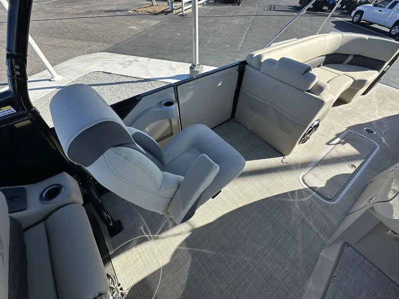 Slide: The Image of 2023 Silver Wave 2410 SW7 JS boat interior with plush seating and modern design. - 6