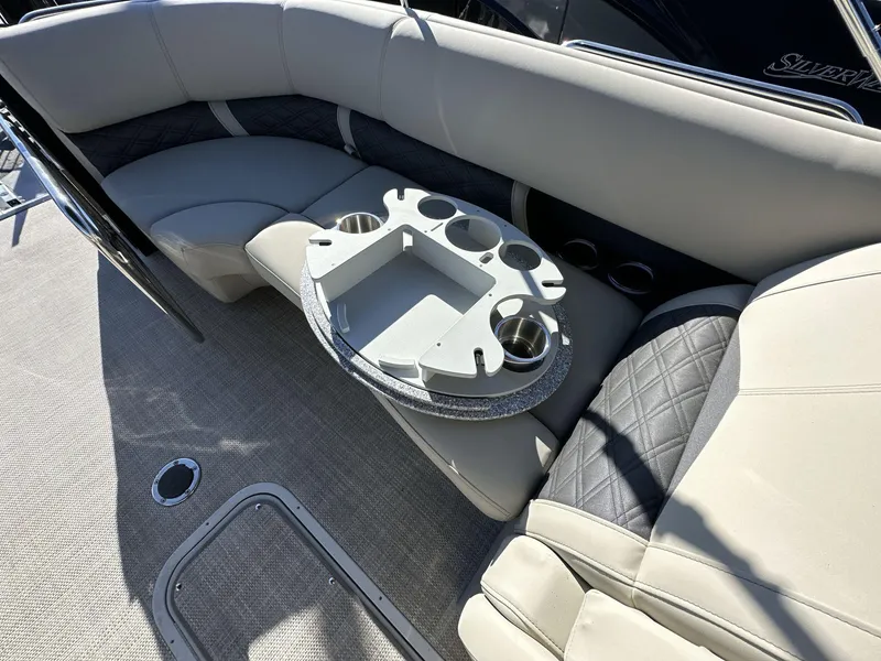 Slide: The Image of Luxurious seating area on 2023 Silver Wave 2410 SW7 JS boat with cup holders. - 8