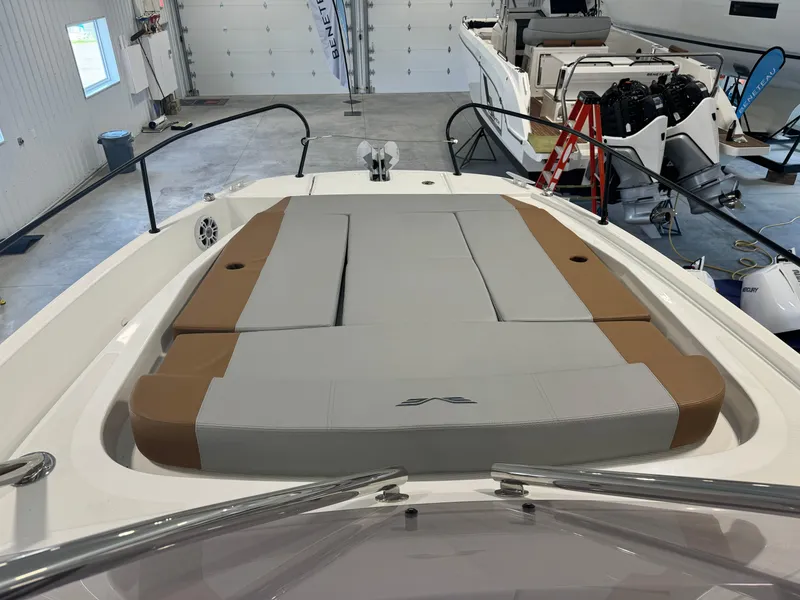Slide: The Image of 2023 Beneteau Flyer 9 SUNdeck boat with spacious sunbathing area in a showroom. - 10
