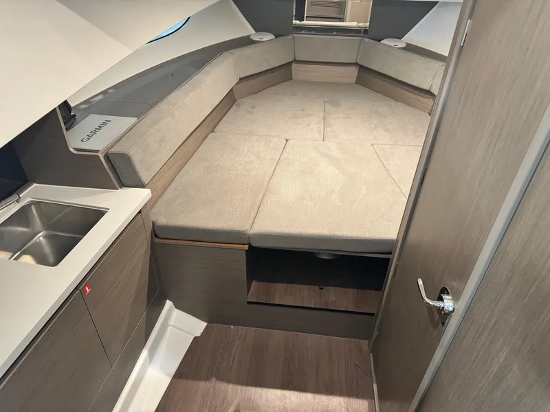 Slide: The Image of 2023 Beneteau Flyer 9 SUNdeck cabin interior with bed and kitchenette. - 14