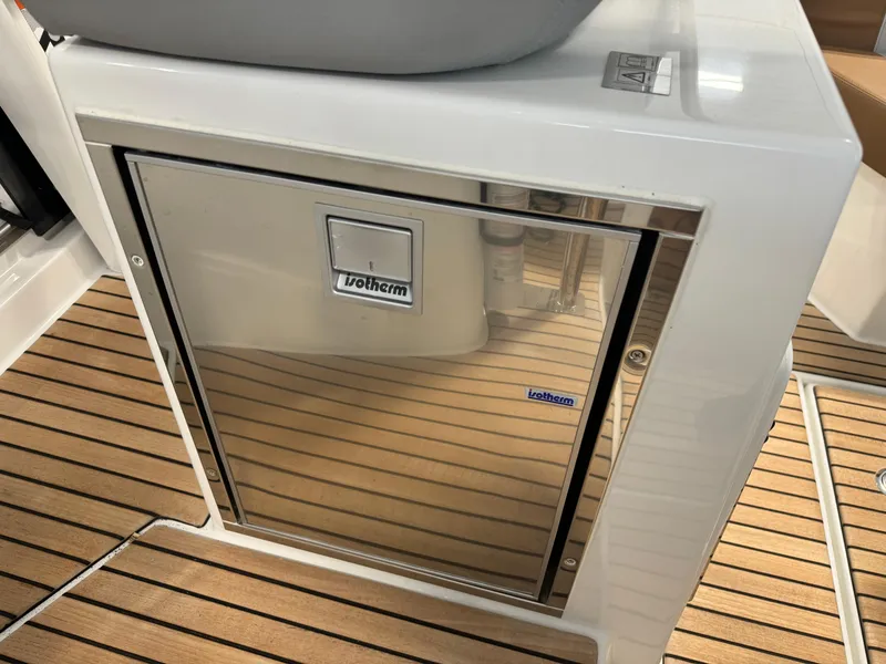 Slide: The Image of Beneteau Flyer 9 SUNdeck 2023 model with Vitrifrigo fridge on teak deck. - 22