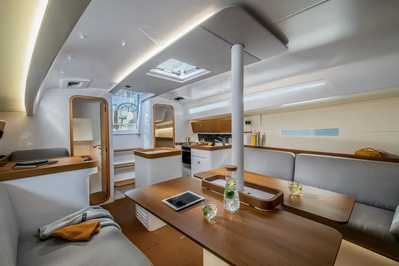 Slide: The Image of Luxurious interior of 2023 Beneteau First 36 sailboat, featuring modern design and comfortable seating. - 27