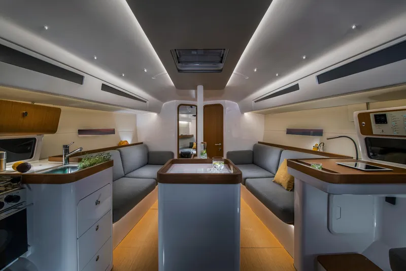 Slide: The Image of Luxurious interior of 2023 Beneteau First 36 sailboat, featuring modern design and comfortable seating. - 29