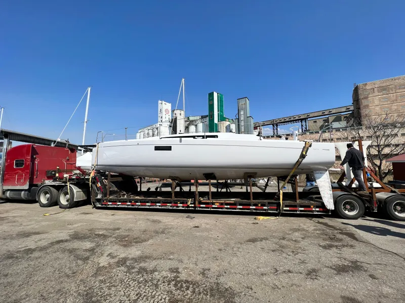 Slide: The Image of 2023 Beneteau First 36 sailboat on trailer, ready for transport. - 38