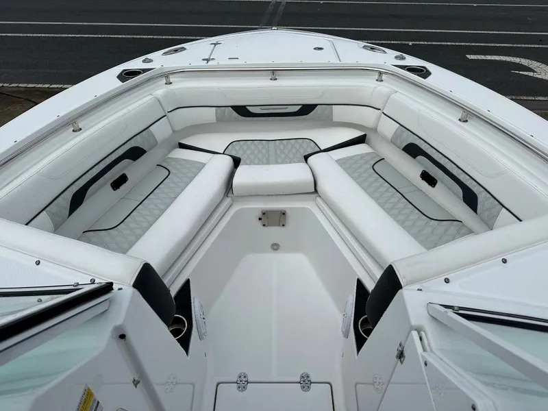 Slide: The Image of 2023 Blackfin 252 DC boat with spacious white seating area. - 4