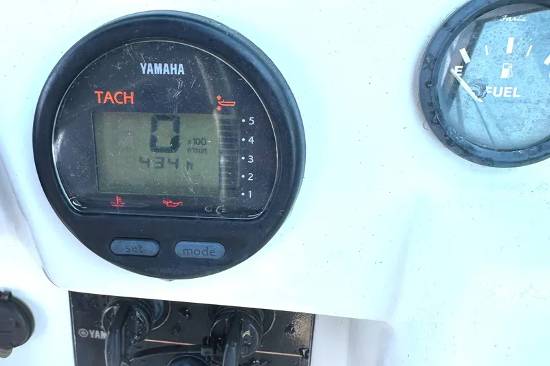 Slide: The Image of Yamaha tachometer and fuel gauge on 2006 Glacier Bay 2240 Dual Console boat. - 13