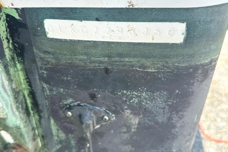 Slide: The Image of Close-up of a 2006 Glacier Bay 2240 Dual Console boat hull identification number. - 16