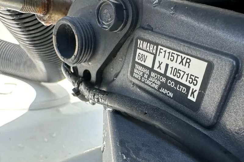 Slide: The Image of Close-up of Yamaha F115TXR engine label on 2006 Glacier Bay 2240 Dual Console. - 19