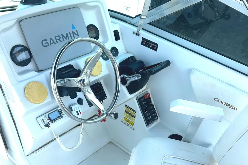 Slide: The Image of 2006 Glacier Bay 2240 Dual Console boat helm with Garmin navigation system. - 9