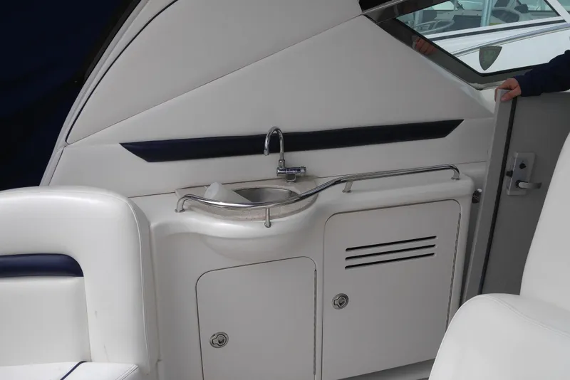 Slide: The Image of Interior view of 2011 Sea Ray 390 Sundancer yacht with sink and storage. - 15