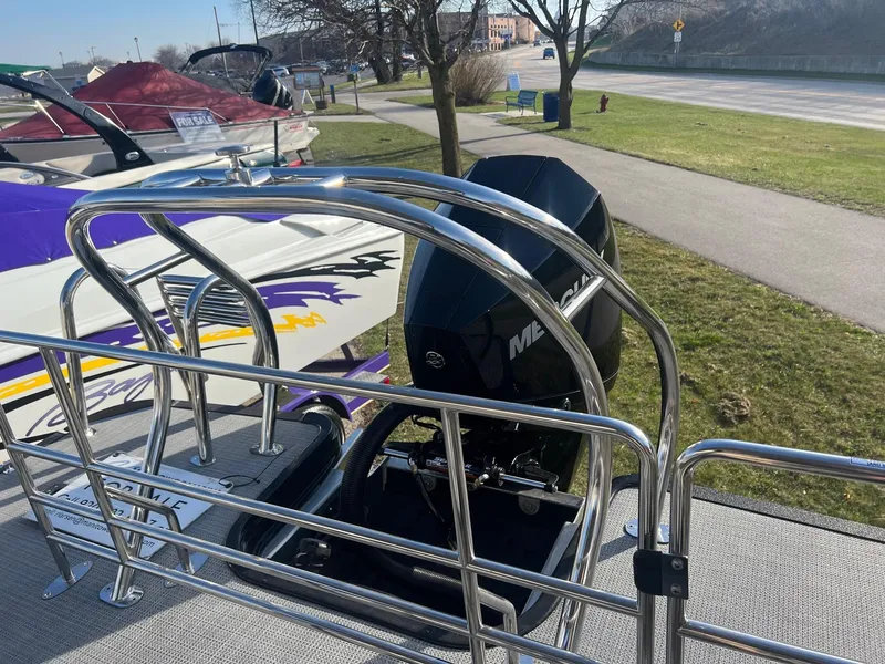 Slide: The Image of 2023 Starcraft EXS 5 Q pontoon boat with Mercury outboard motor. - 21