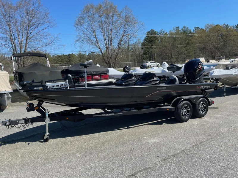 The Image of 2023 Vexus AVX 2080 boat on a trailer in a parking lot. - 0