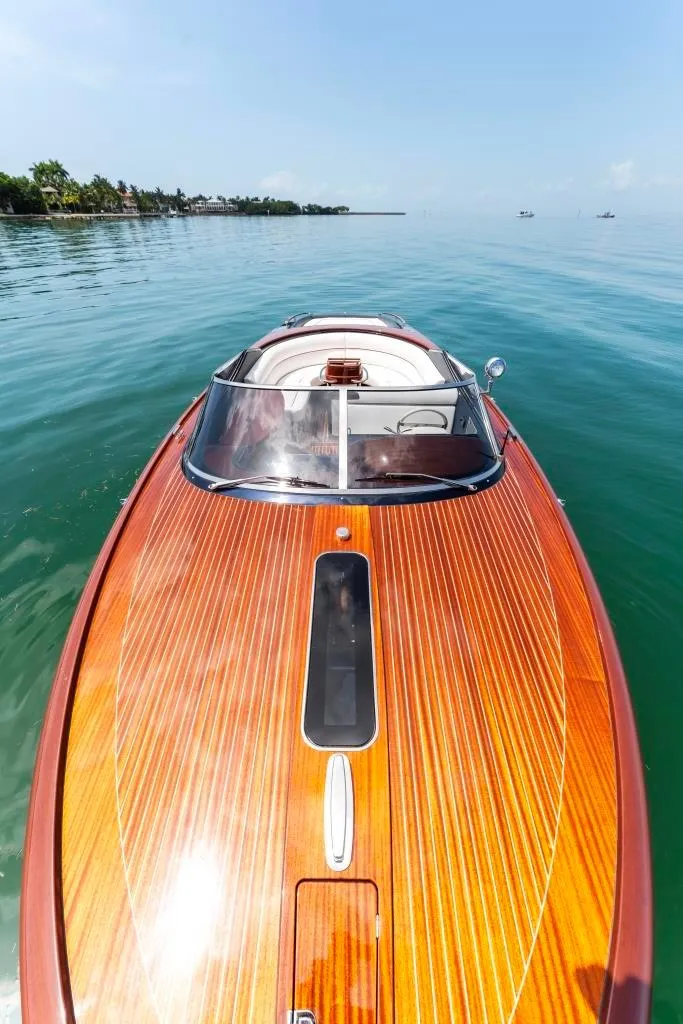 Slide: The Image of 2020 Riva Aquariva Super luxury speedboat on calm waters. - 11