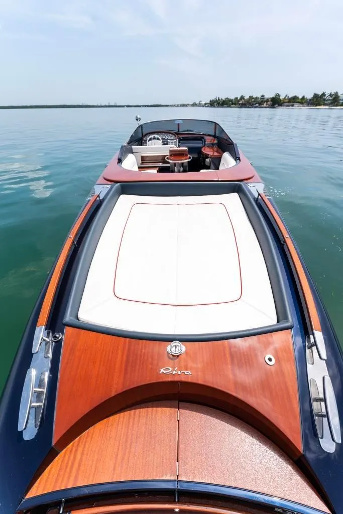 Slide: The Image of 2020 Riva Aquariva Super luxury yacht on calm waters. - 13