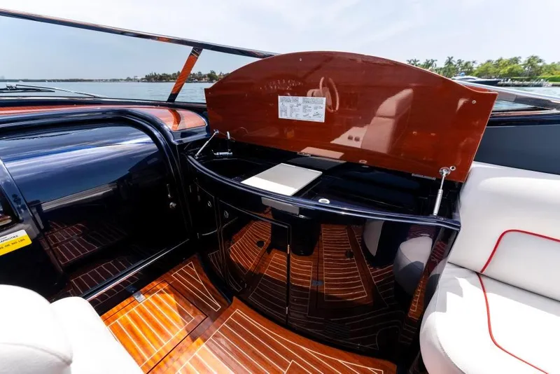 Slide: The Image of Interior of 2020 Riva Aquariva Super luxury yacht with polished wood and sleek design. - 19