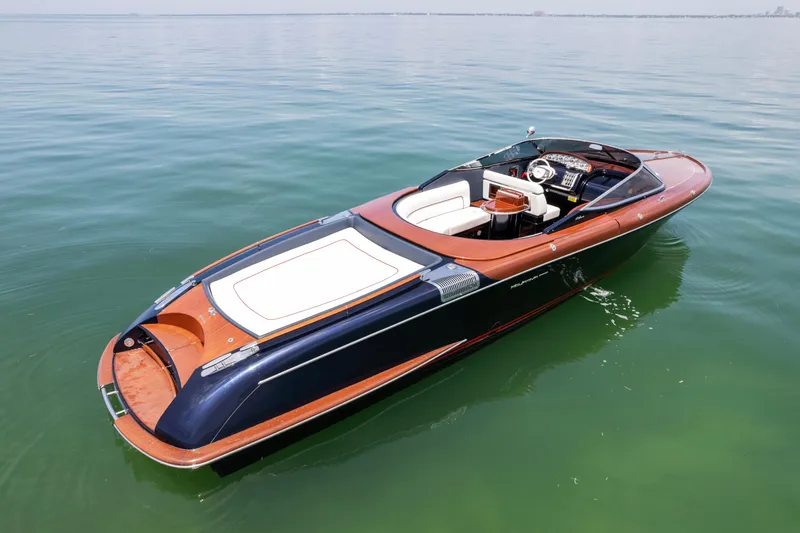 Slide: The Image of 2020 Riva Aquariva Super luxury speedboat on calm water. - 5