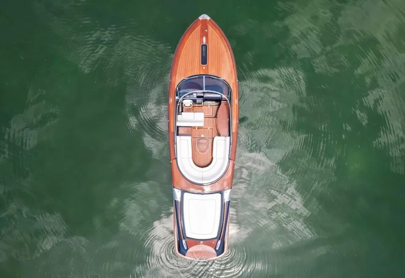 Slide: The Image of Aerial view of a 2020 Riva Aquariva Super luxury boat on water. - 8