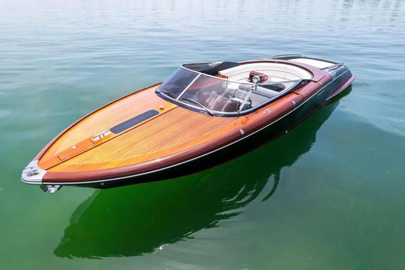 Slide: The Image of 2020 Riva Aquariva Super luxury speedboat on calm water. - 10