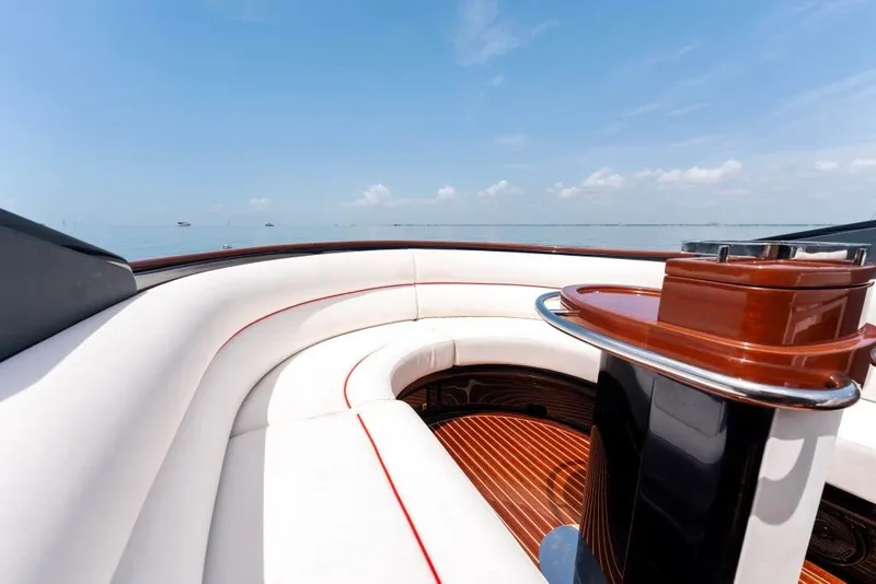 Slide: The Image of Luxurious seating area on a 2020 Riva Aquariva Super yacht with ocean view. - 16
