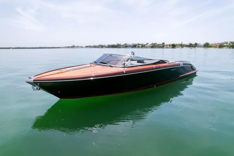 Slide: The Image of 2020 Riva Aquariva Super luxury speedboat on calm water. - 6
