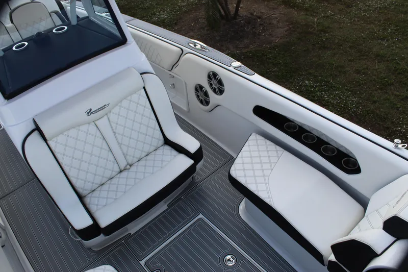 Slide: The Image of Luxurious seating on 2019 Renegade 33 Cuddy boat with quilted upholstery. - 23