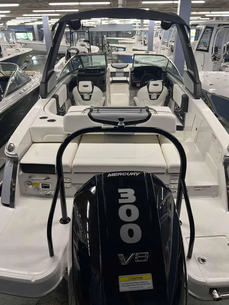 Slide: The Image of 2023 Chaparral 270 OSX boat with Mercury 300 V8 engine in showroom. - 6