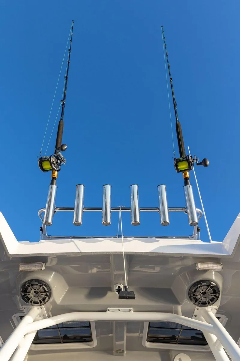 Slide: The Image of 2023 Solara S-250 CW boat with fishing rods and rod holders. - 14