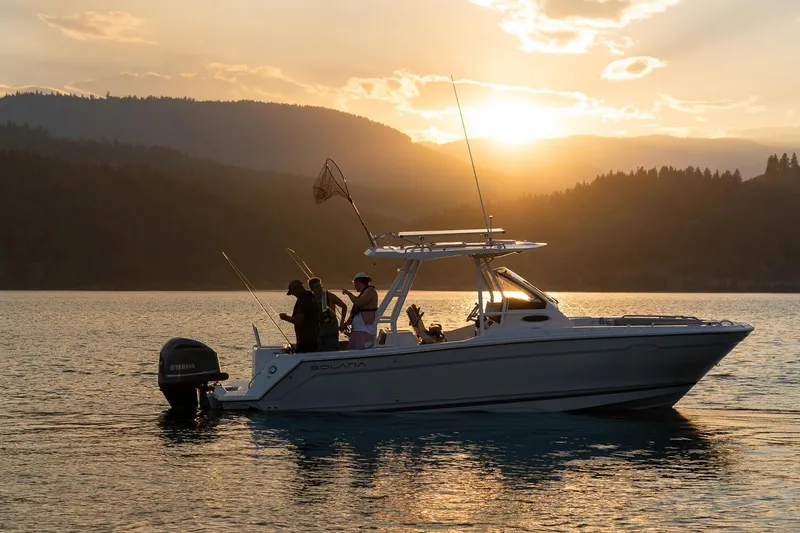 Slide: The Image of Solara S-250 CW boat on a lake at sunset, 2023 model - 8