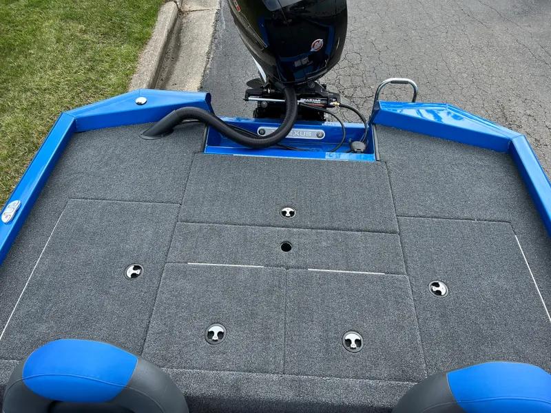 Slide: The Image of 2023 Vexus AVX1980 boat deck with motor, blue and gray color scheme. - 16