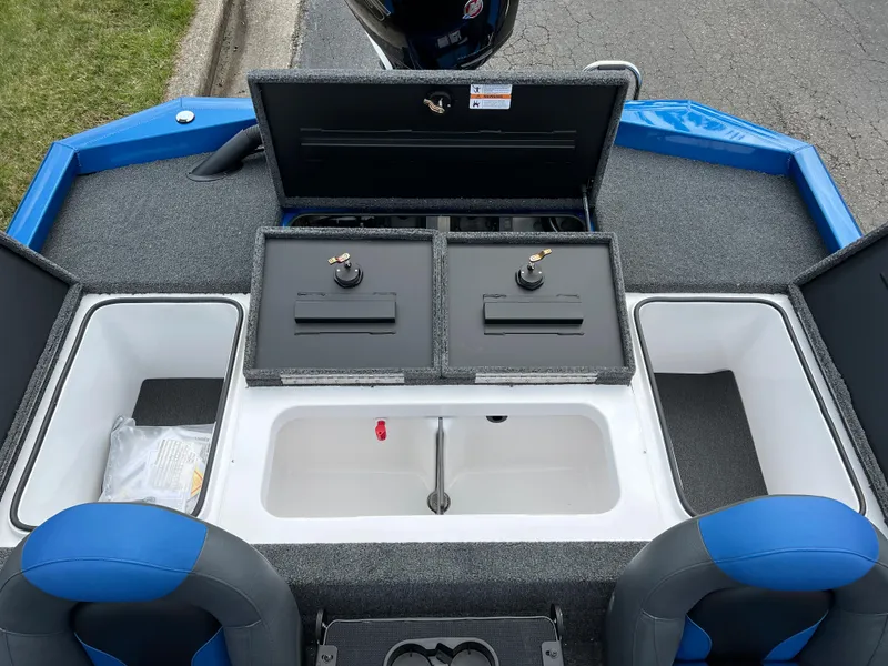 Slide: The Image of 2023 Vexus AVX1980 boat interior with storage compartments and seating. - 17