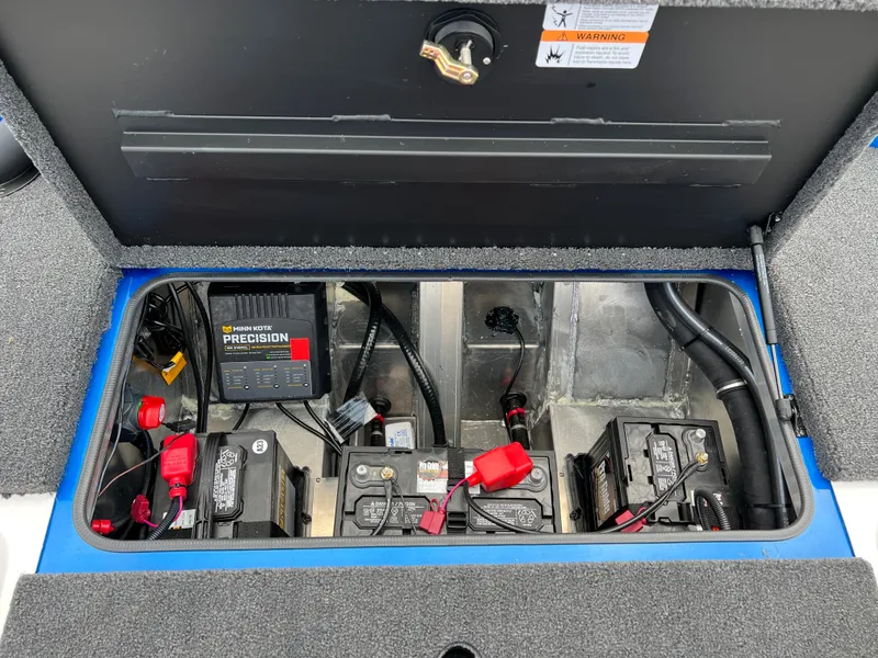 Slide: The Image of 2023 Vexus AVX1980 boat battery compartment with wiring and charger. - 18