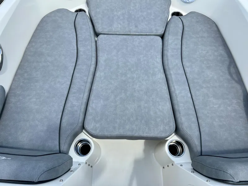 Slide: The Image of 2021 Stingray 191 DC boat interior with gray cushioned seating. - 20