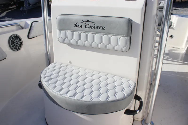 Slide: The Image of 2023 Sea Chaser 20 HFC boat seat with hexagonal pattern and logo. - 15