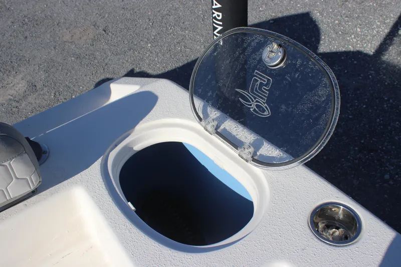 Slide: The Image of Open hatch on 2023 Sea Chaser 20 HFC boat, showing storage compartment. - 16