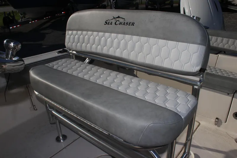 Slide: The Image of 2023 Sea Chaser 20 HFC boat seat with gray and white hexagonal pattern upholstery. - 8