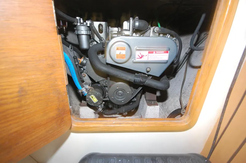 Slide: The Image of Engine compartment of a 1999 Wildcat 35 Catamaran. - 41