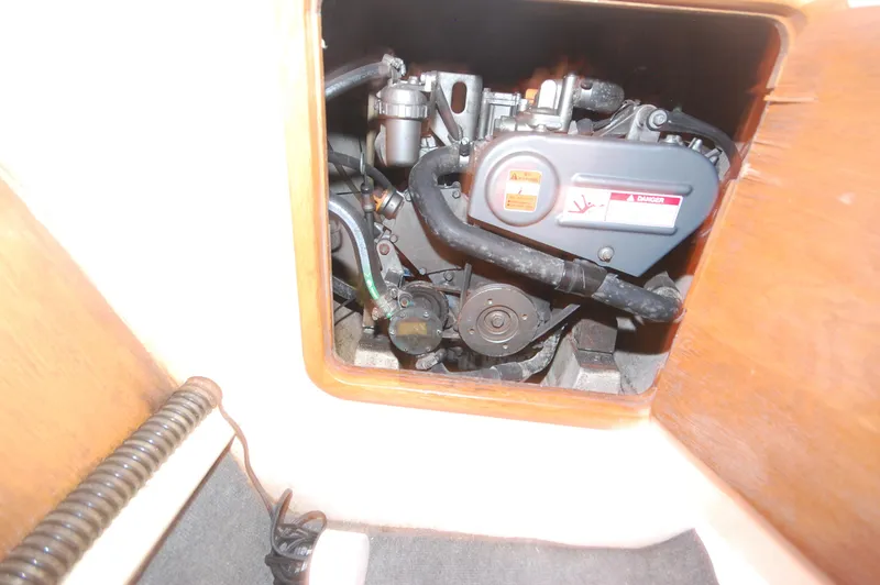 Slide: The Image of Engine compartment of a 1999 Wildcat 35 Catamaran. - 42