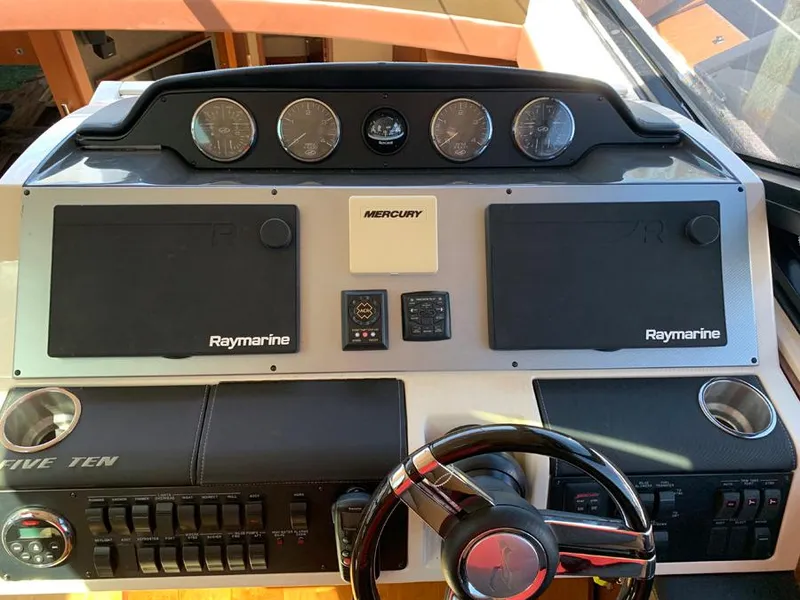 Slide: The Image of Control panel of a 2014 Sea Ray 510 Sundancer yacht with Raymarine electronics. - 2