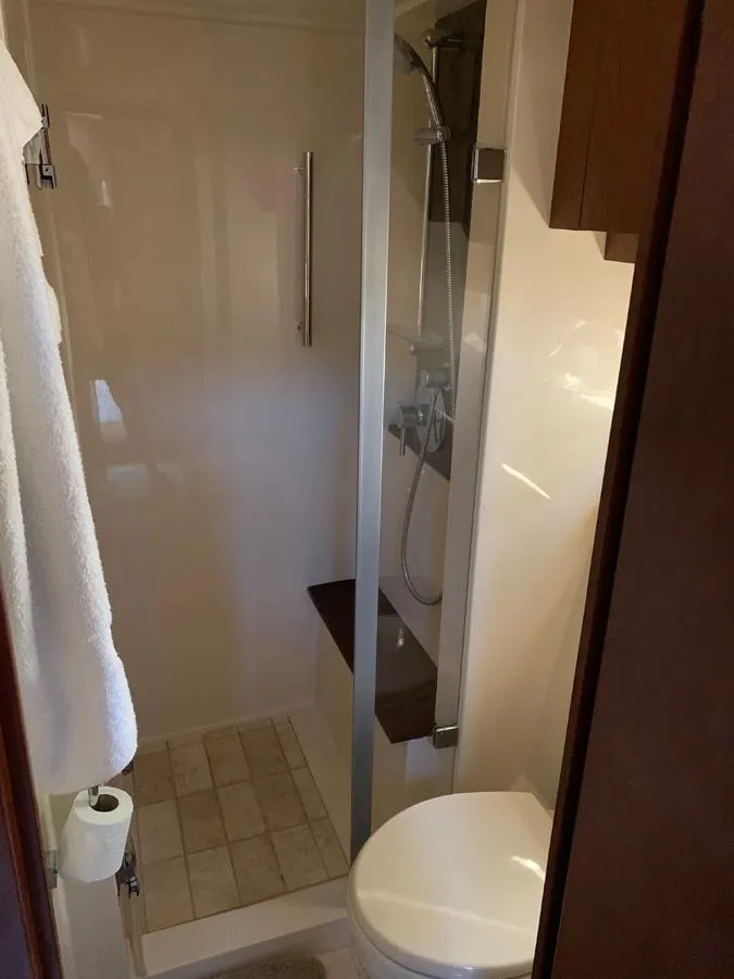 Slide: The Image of Bathroom interior of 2014 Sea Ray 510 Sundancer yacht with shower and toilet. - 30