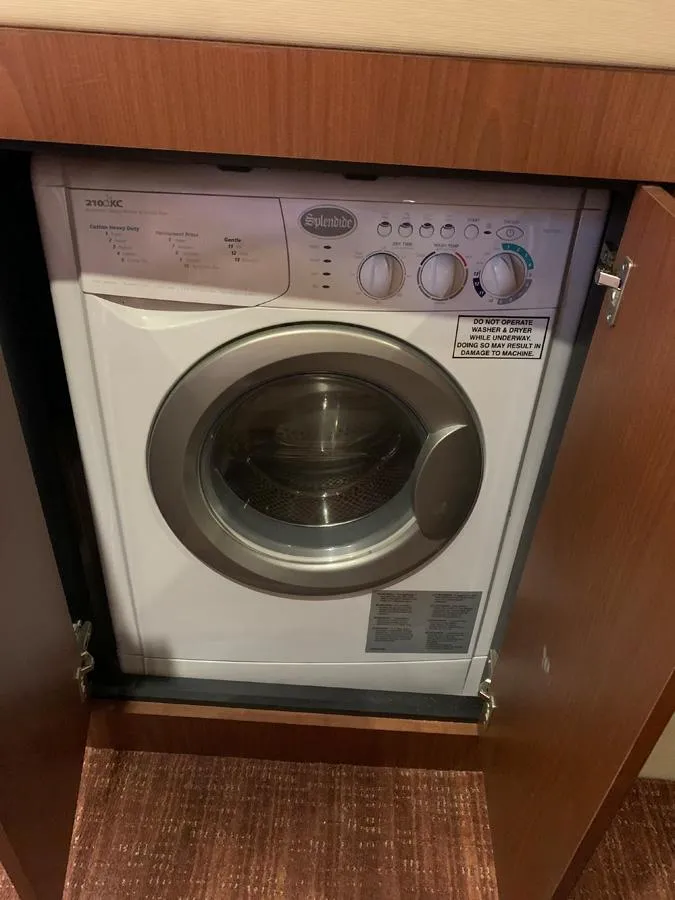Slide: The Image of Built-in washing machine on 2014 Sea Ray 510 Sundancer yacht. - 31