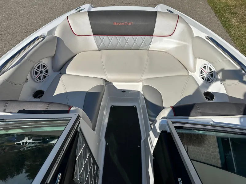 Slide: The Image of Interior of a 2011 MasterCraft X2 boat with white leather seating. - 11